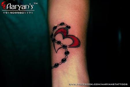 Blood Works Tattoo Studio - #bracelets #tattoobracelets #braceletstattoo  smalltattoo #heartbeat #letter #alphabet #art #artist #indianart  #nametattoo #heart #hearttattoo #colourtattoo #blackoutline #tattoo #tattoos  #tattooart #art #tattoowork ...